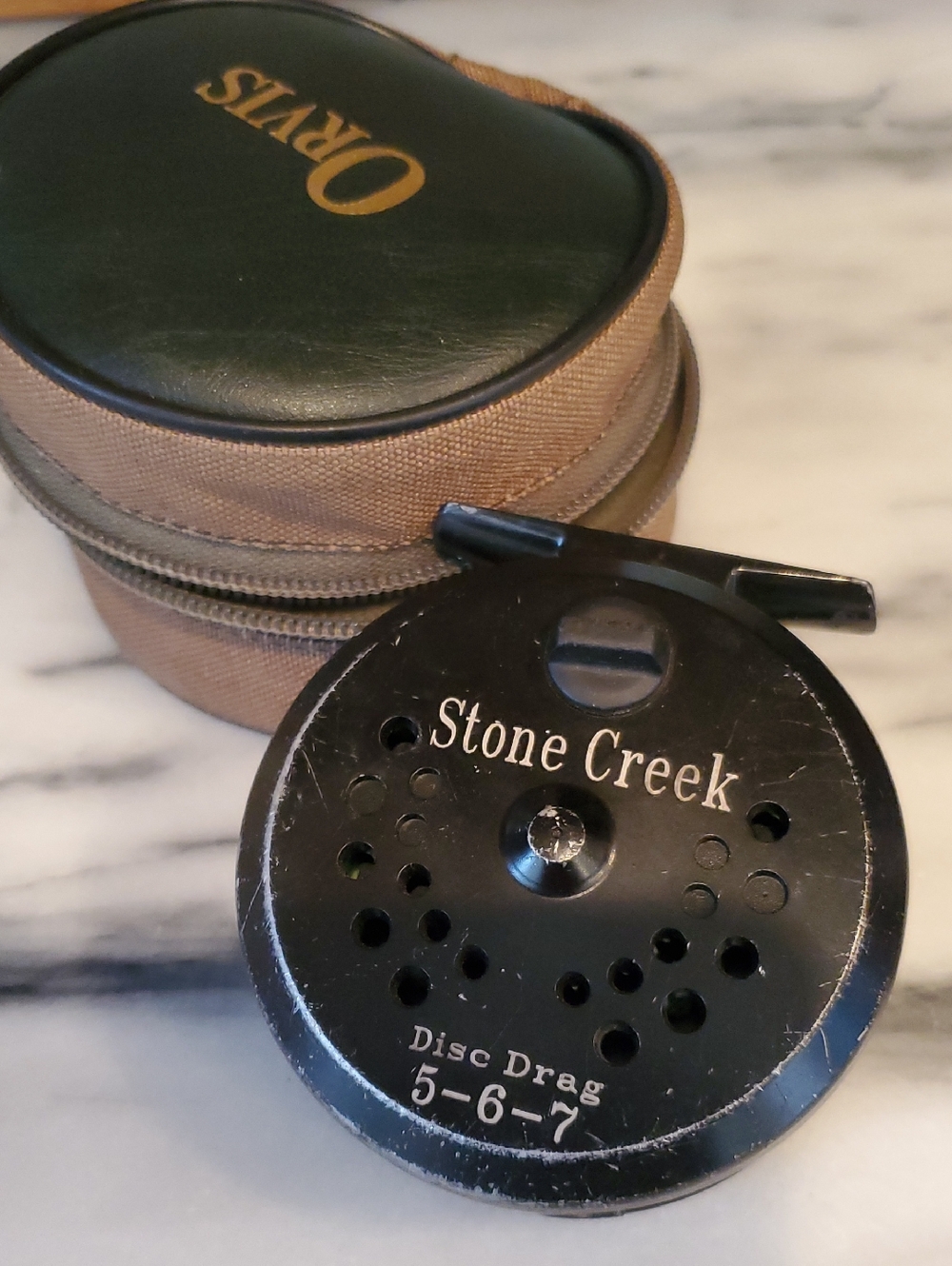 Vintage Stone Creek Black Fishing Reel with Orvis Zip Case